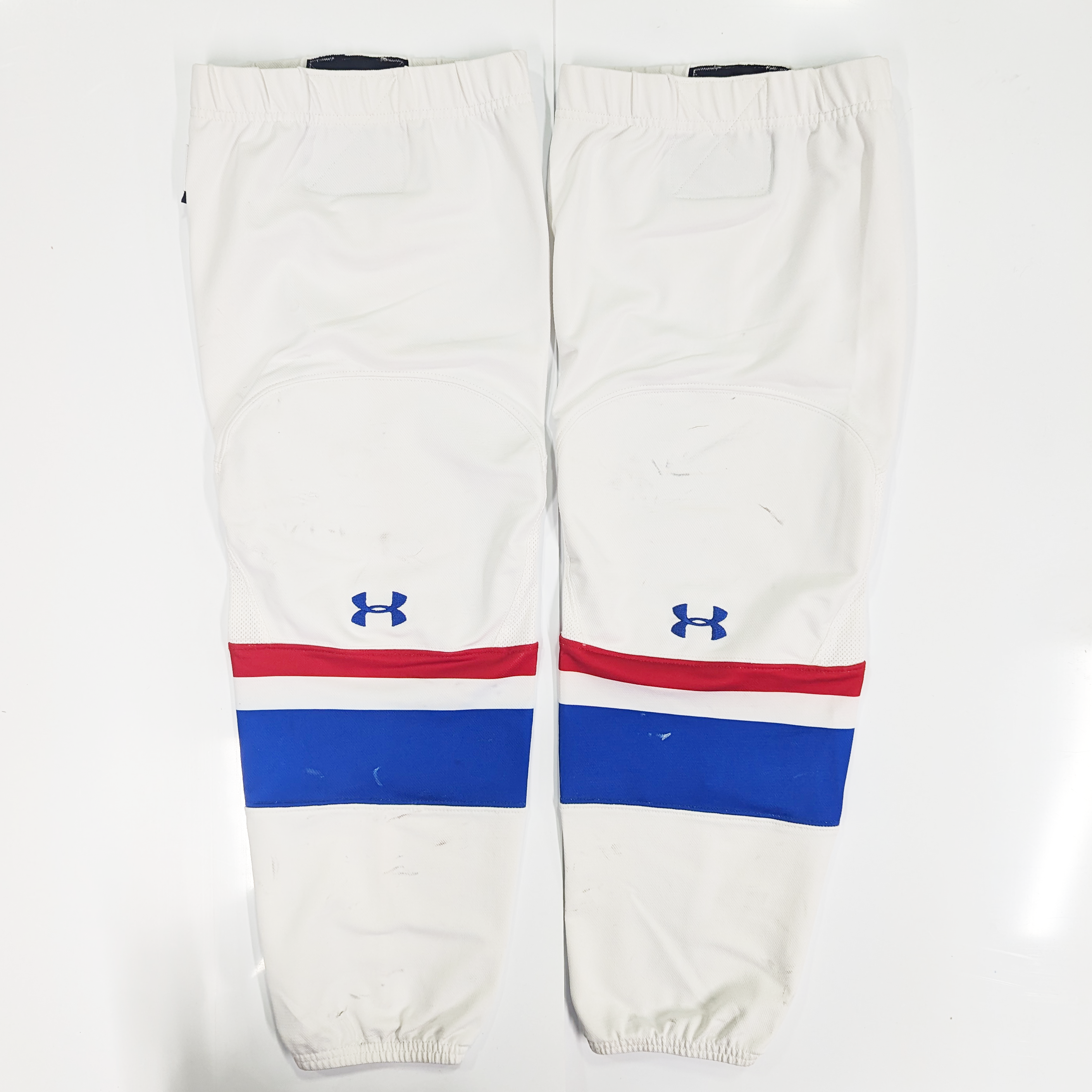 NCAA - Chaussettes de hockey Under Armour d'occasion (blanc/rouge/bleu)